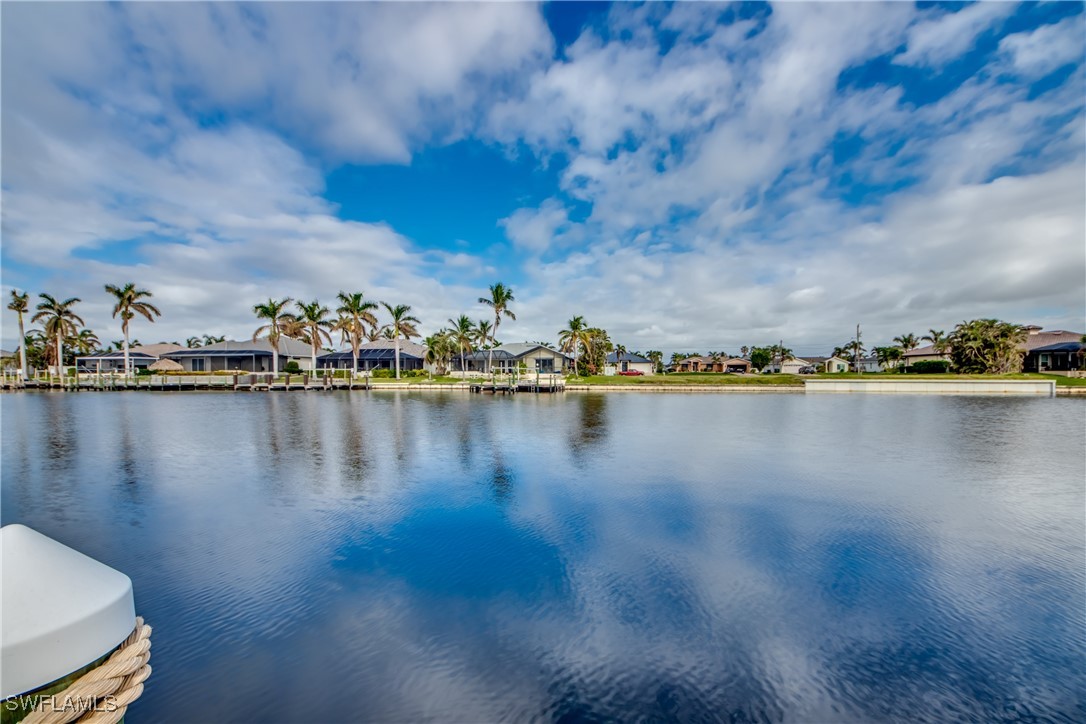 2703 Southwest 43rd Terrace Cape Coral, FL 33914 - Photo 47 of 50 a view of a water with boats and trees in the background