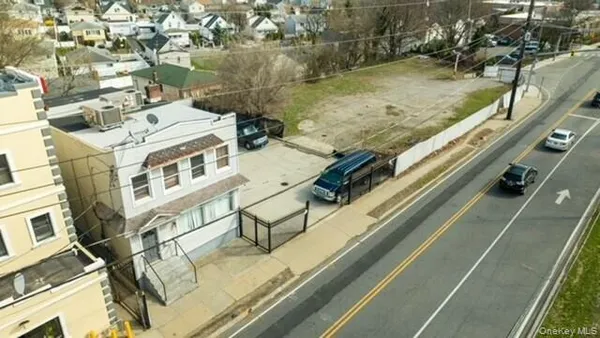 a view of balcony with a yard