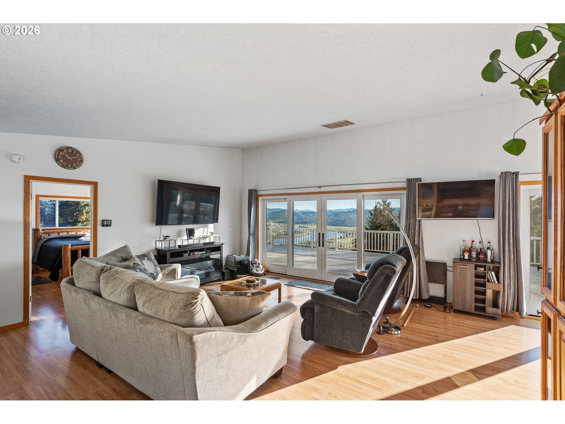 770 18th Avenue Coos Bay, OR 97420 - Photo 12 of 48 a living room with furniture fireplace and a flat screen tv