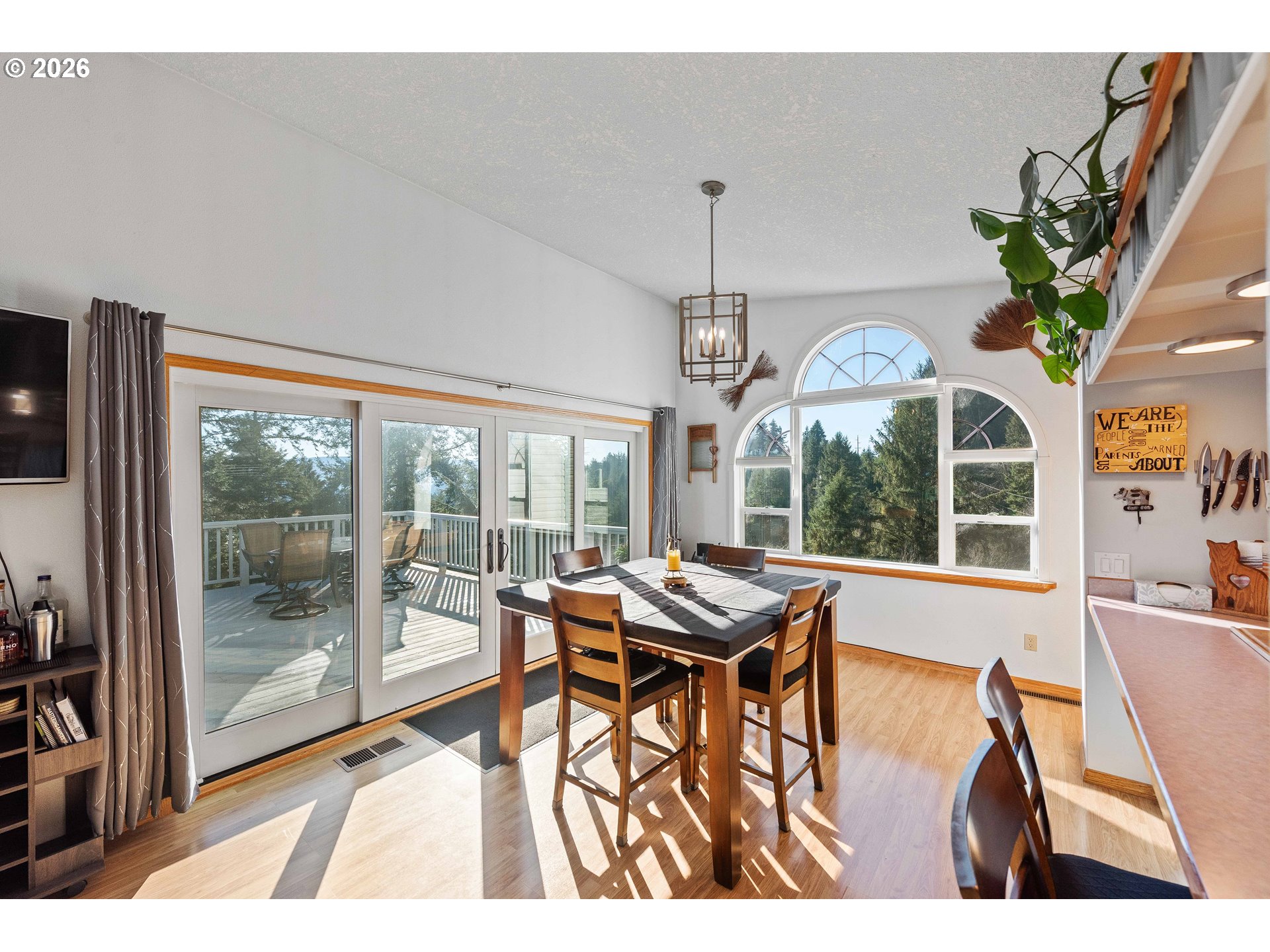 770 18th Avenue Coos Bay, OR 97420 - Photo 16 of 48 a view of a dining room with furniture window and outside view