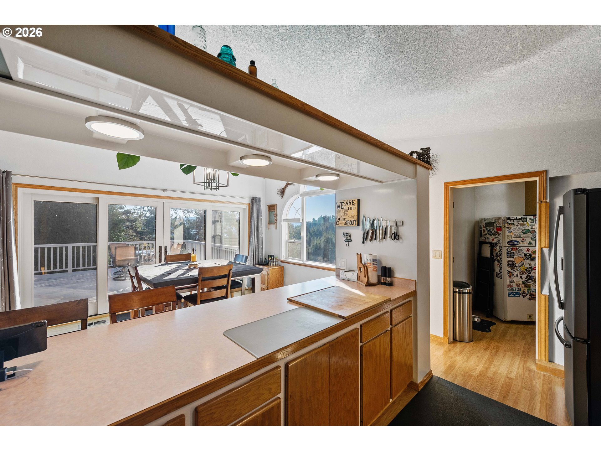 770 18th Avenue Coos Bay, OR 97420 - Photo 21 of 48 a kitchen with a sink and large windows