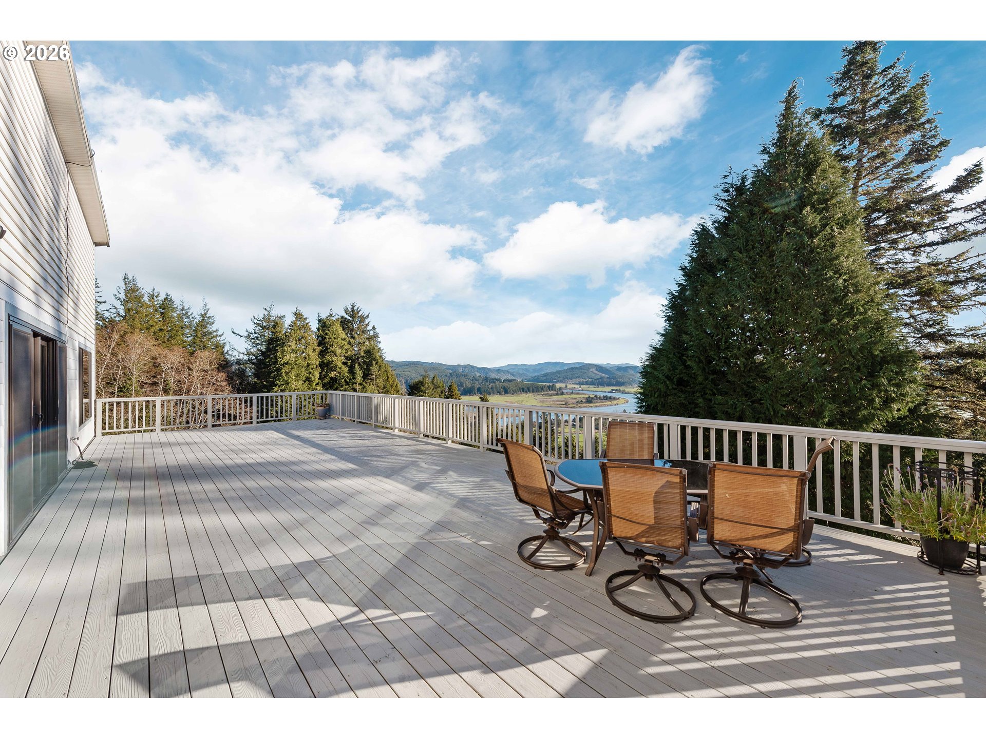 770 18th Avenue Coos Bay, OR 97420 - Photo 22 of 48 a view of a patio with a table and chairs