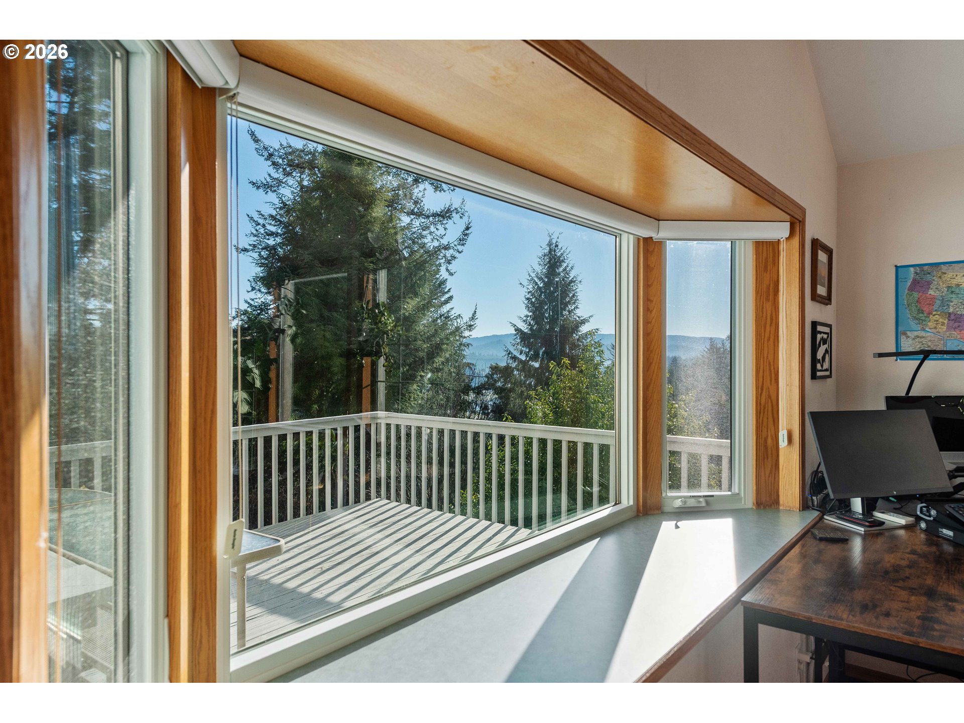 770 18th Avenue Coos Bay, OR 97420 - Photo 36 of 48 a view of a balcony with chair and floor to ceiling window