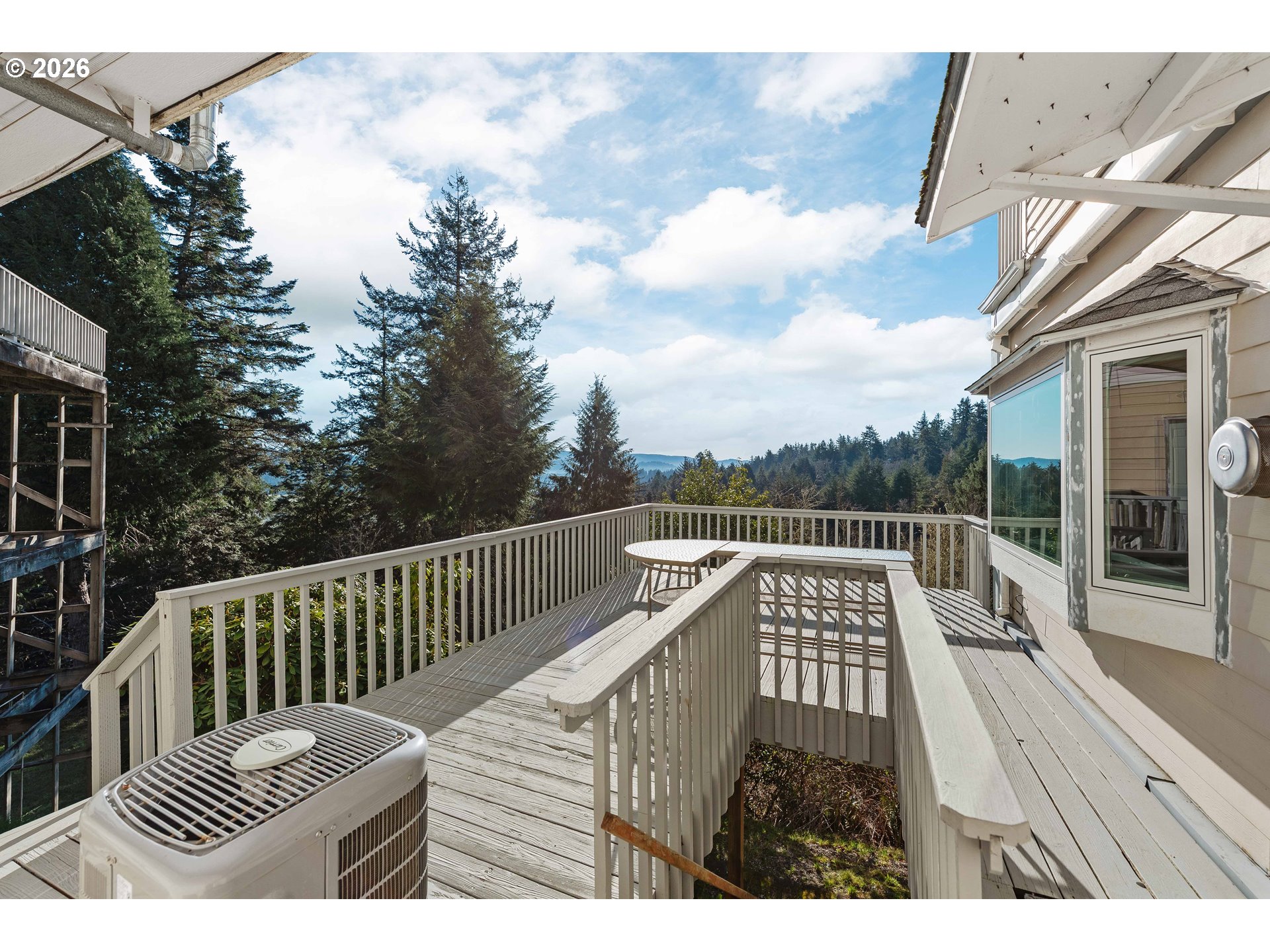 770 18th Avenue Coos Bay, OR 97420 - Photo 37 of 48 a view of balcony with wooden floor and fence
