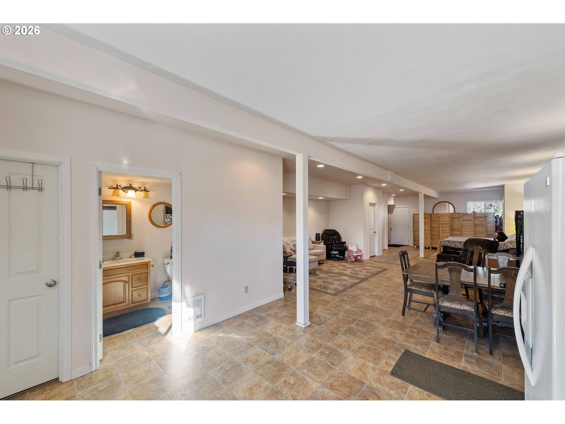 770 18th Avenue Coos Bay, OR 97420 - Photo 39 of 48 a living room with furniture and wooden floor