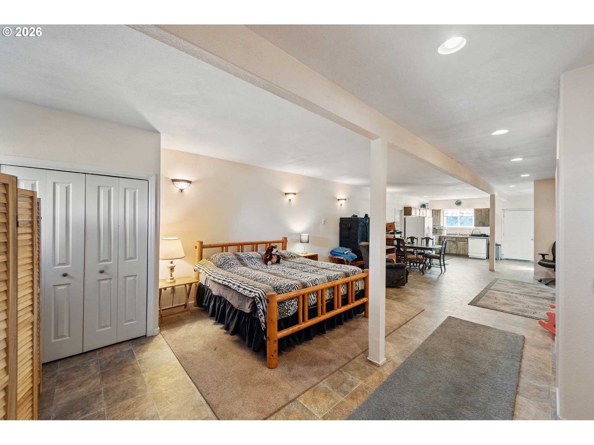 770 18th Avenue Coos Bay, OR 97420 - Photo 41 of 48 a room with a bed and a view of kitchen