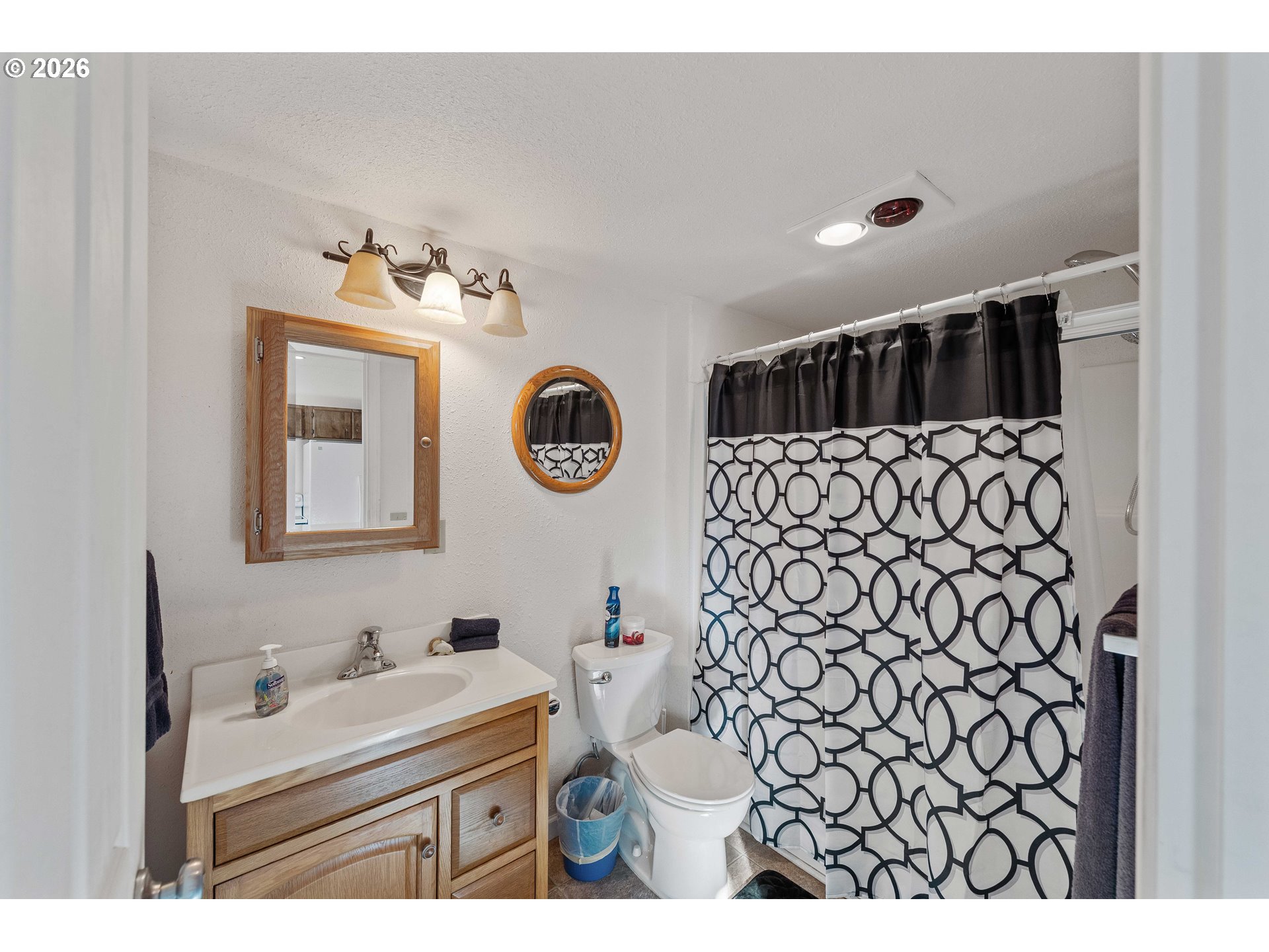 770 18th Avenue Coos Bay, OR 97420 - Photo 45 of 48 a bathroom with a sink toilet and shower