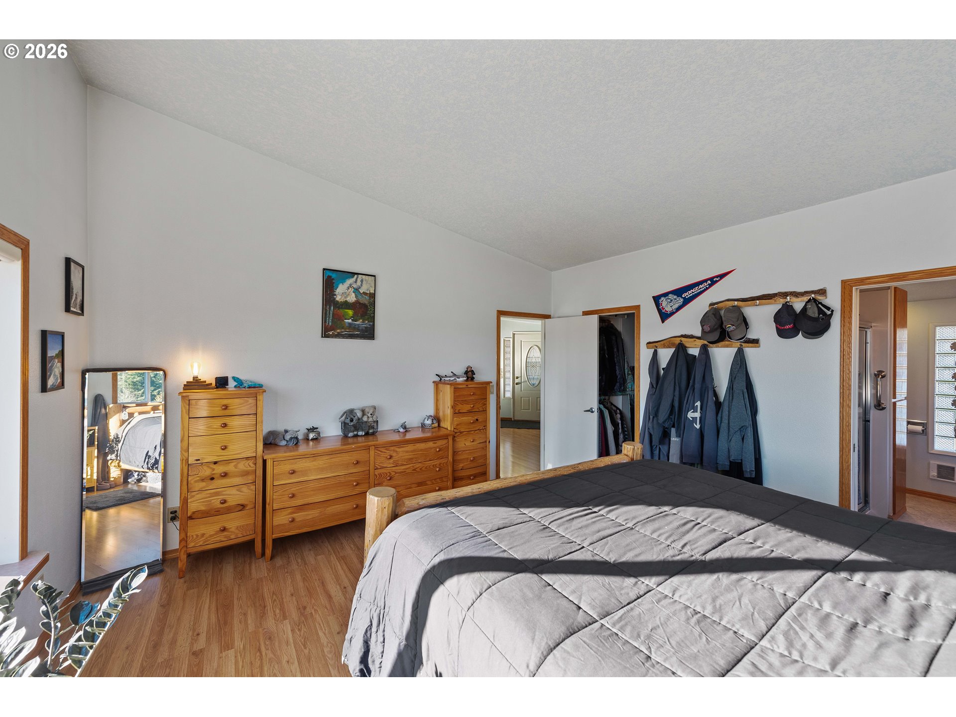 770 18th Avenue Coos Bay, OR 97420 - Photo 5 of 48 a bedroom with a bed and a closet
