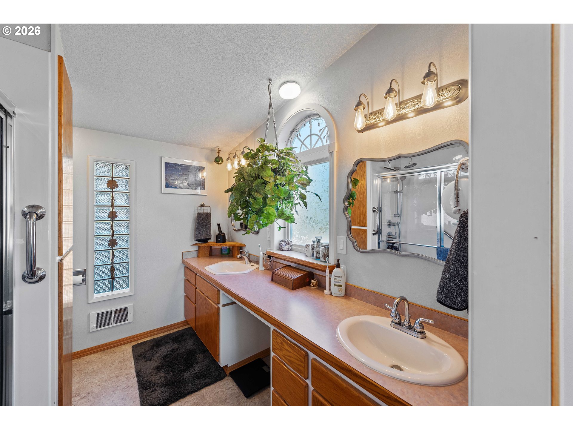 770 18th Avenue Coos Bay, OR 97420 - Photo 6 of 48 a bathroom with a sink double vanity granite and a mirror