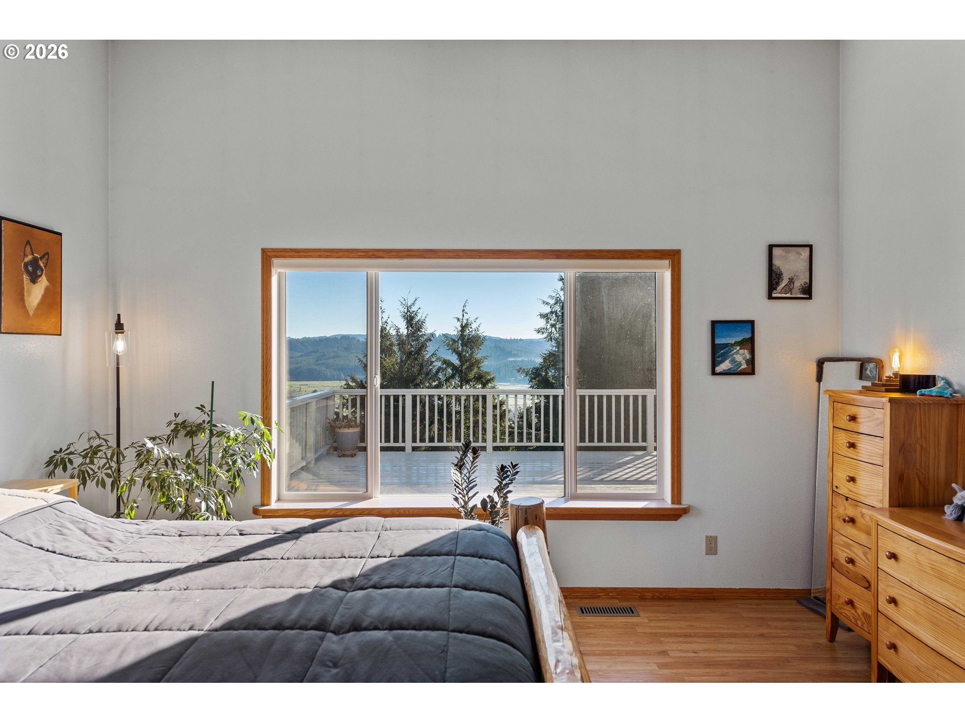 770 18th Avenue Coos Bay, OR 97420 - Photo 8 of 48 a living room with furniture and a flat screen tv