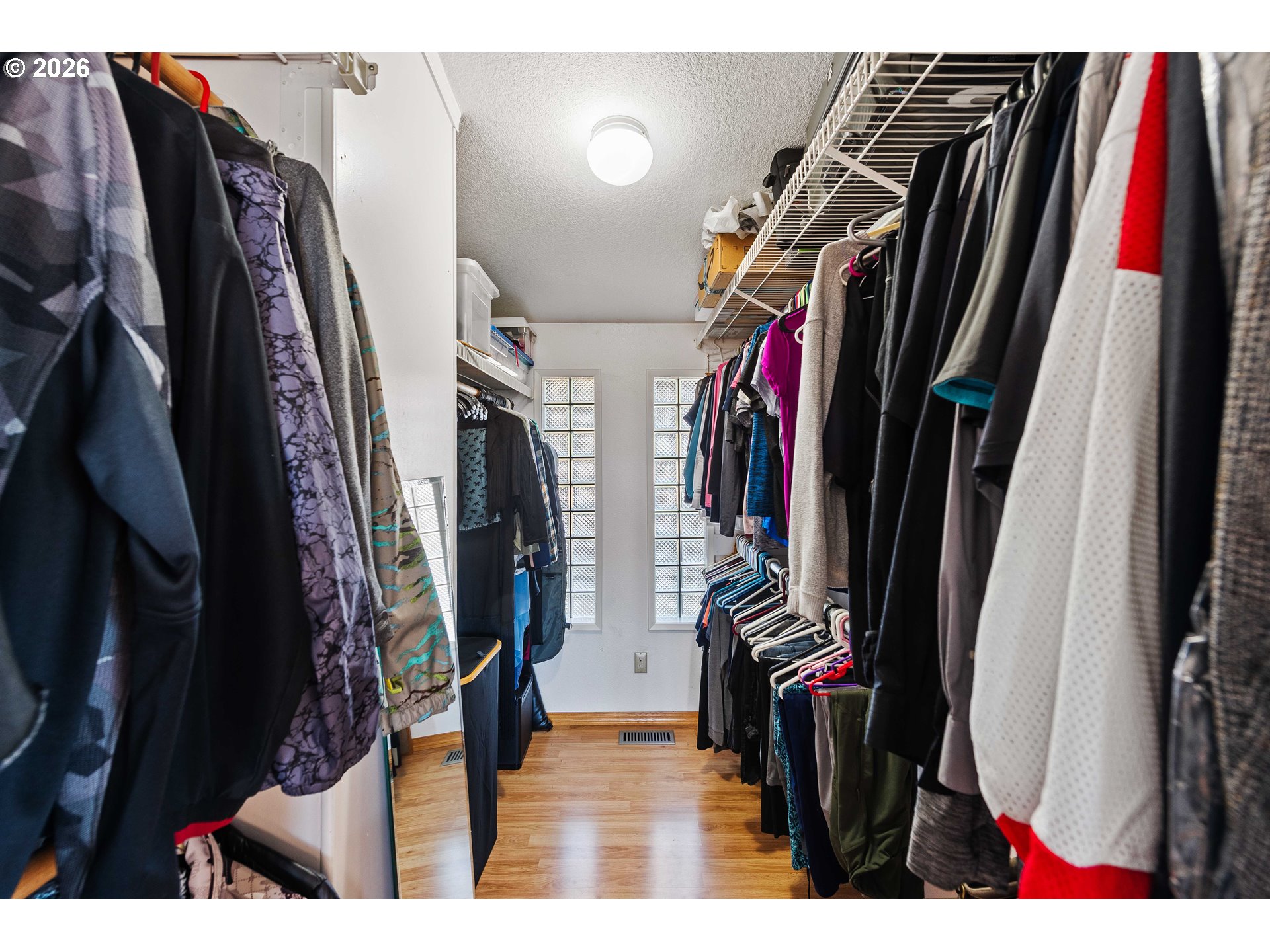 770 18th Avenue Coos Bay, OR 97420 - Photo 9 of 48 a view of walk in closet with clothes and shoes