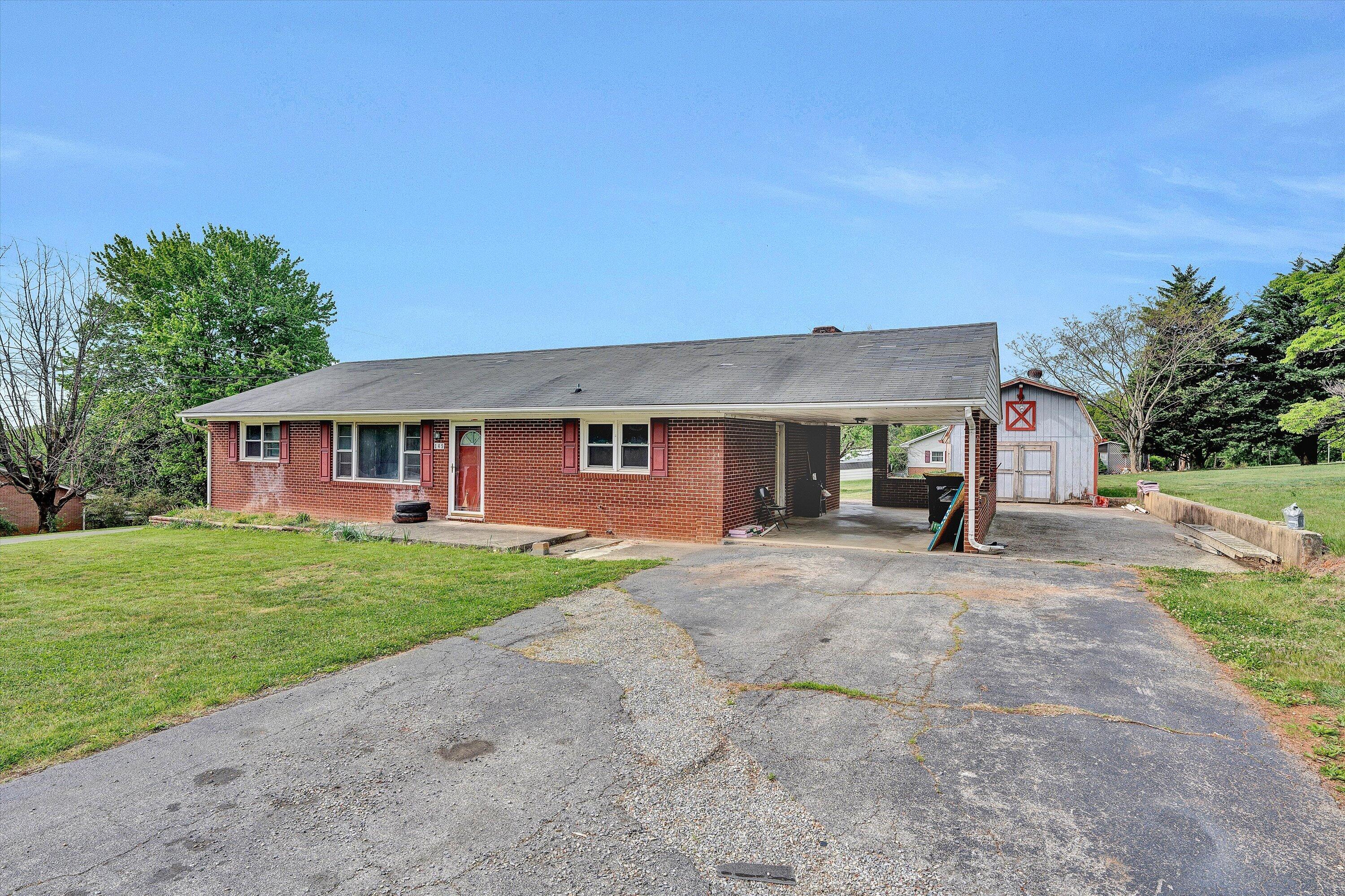 145 Cornell Road Rocky Mount, VA 24151 - Photo 1 of 16 a view of a house with a yard and tree s