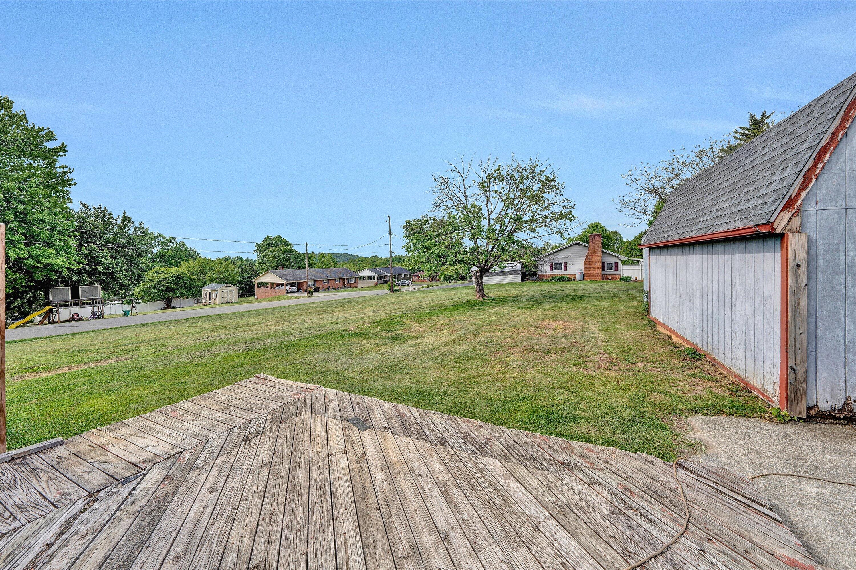 145 Cornell Road Rocky Mount, VA 24151 - Photo 16 of 16 a view of a backyard with a garden