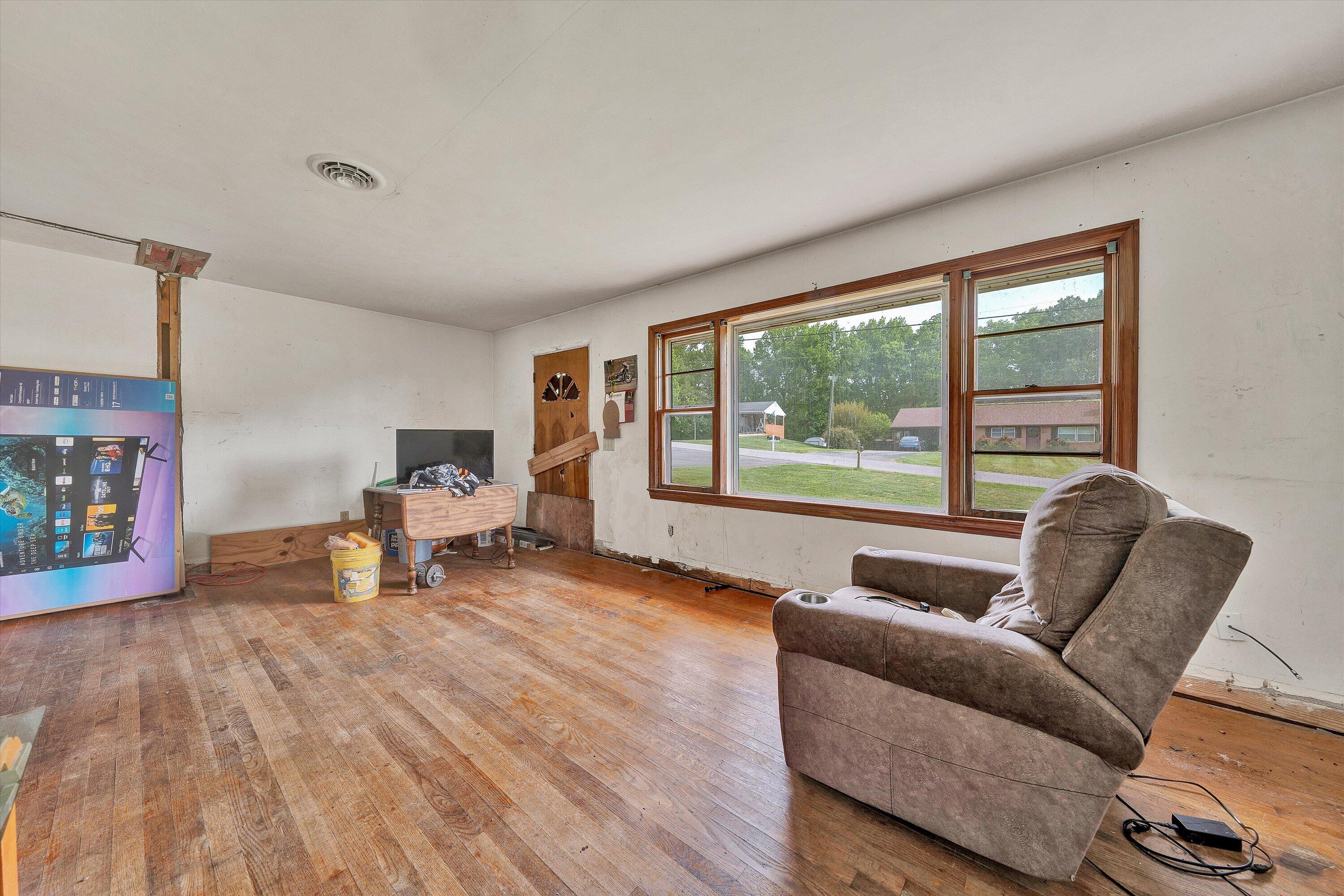 145 Cornell Road Rocky Mount, VA 24151 - Photo 3 of 16 a living room with furniture and a large window