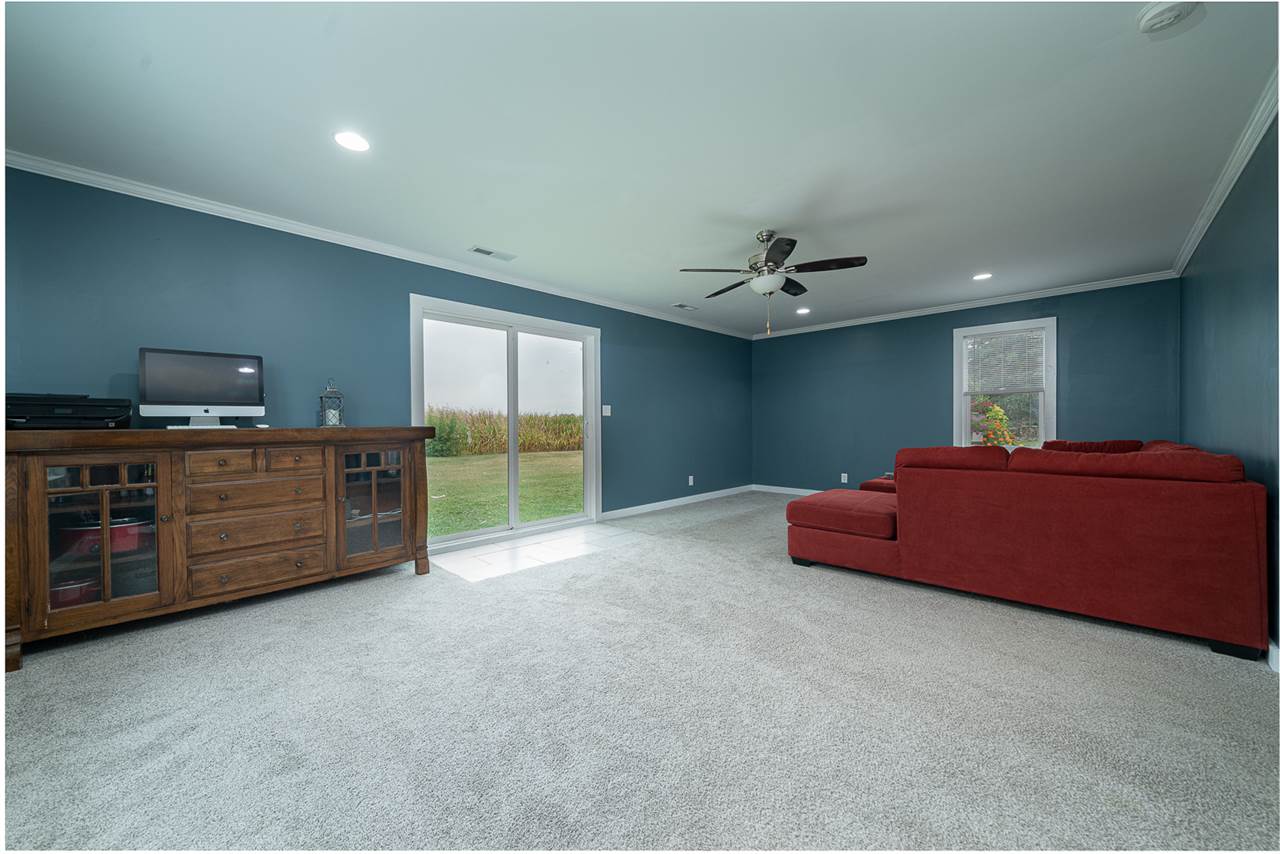 8424 South Main Street Rochelle, IL 61068 - Photo 13 of 26 a room with furniture and a dresser