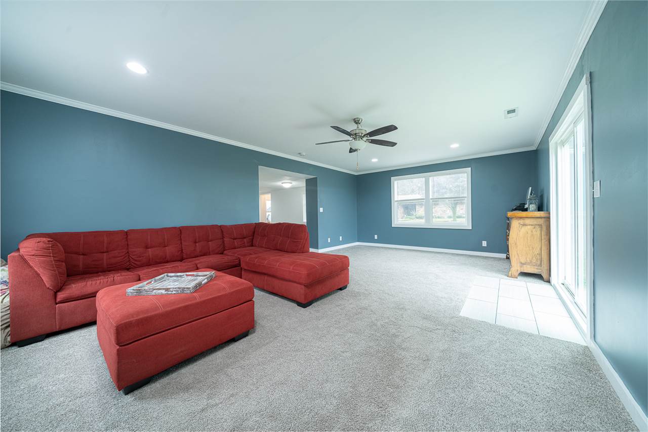 8424 South Main Street Rochelle, IL 61068 - Photo 14 of 26 a living room with furniture and a window