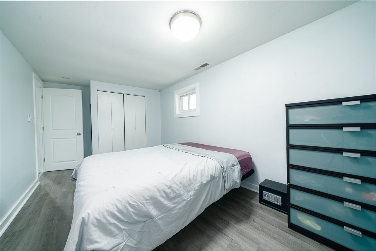 8424 South Main Street Rochelle, IL 61068 - Photo 20 of 26 a bedroom with a bed and a window