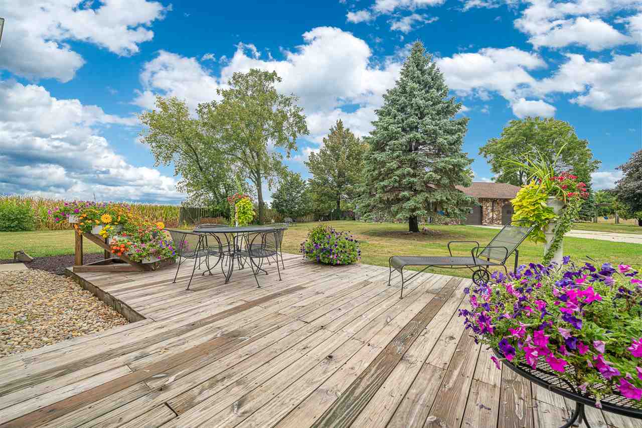 8424 South Main Street Rochelle, IL 61068 - Photo 2 of 26 a view of a chairs and table on the terrace