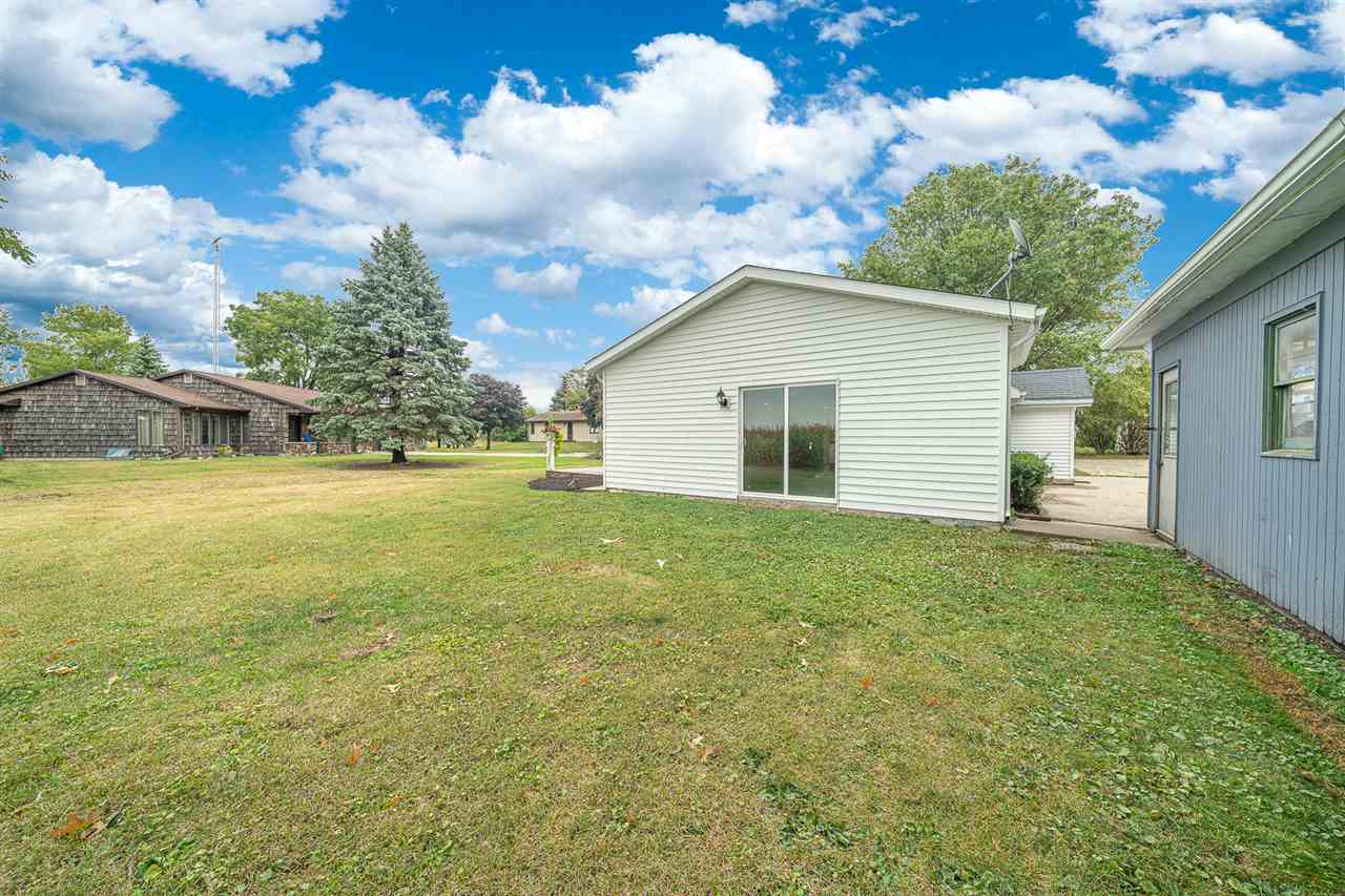 8424 South Main Street Rochelle, IL 61068 - Photo 23 of 26 a view of a yard with a house