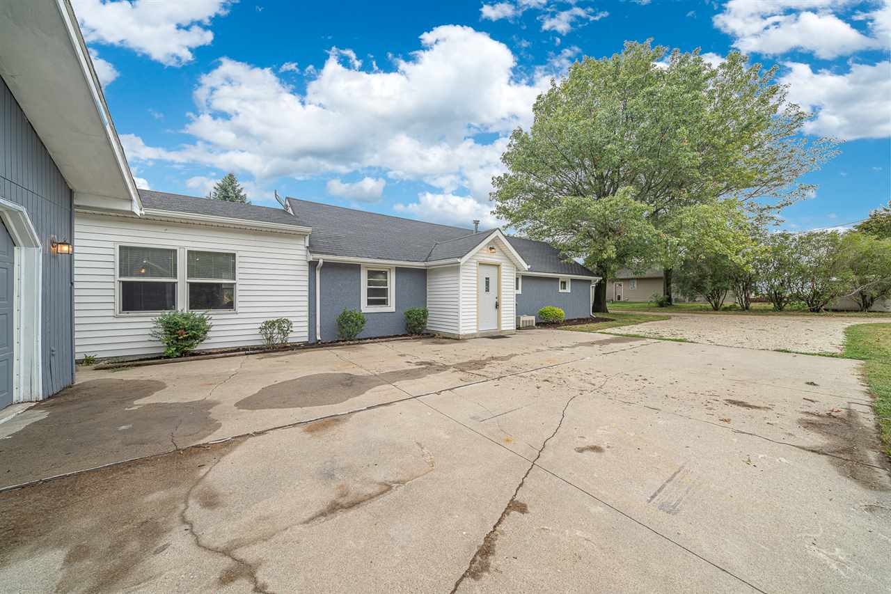 8424 South Main Street Rochelle, IL 61068 - Photo 3 of 26 a view of garage and yard