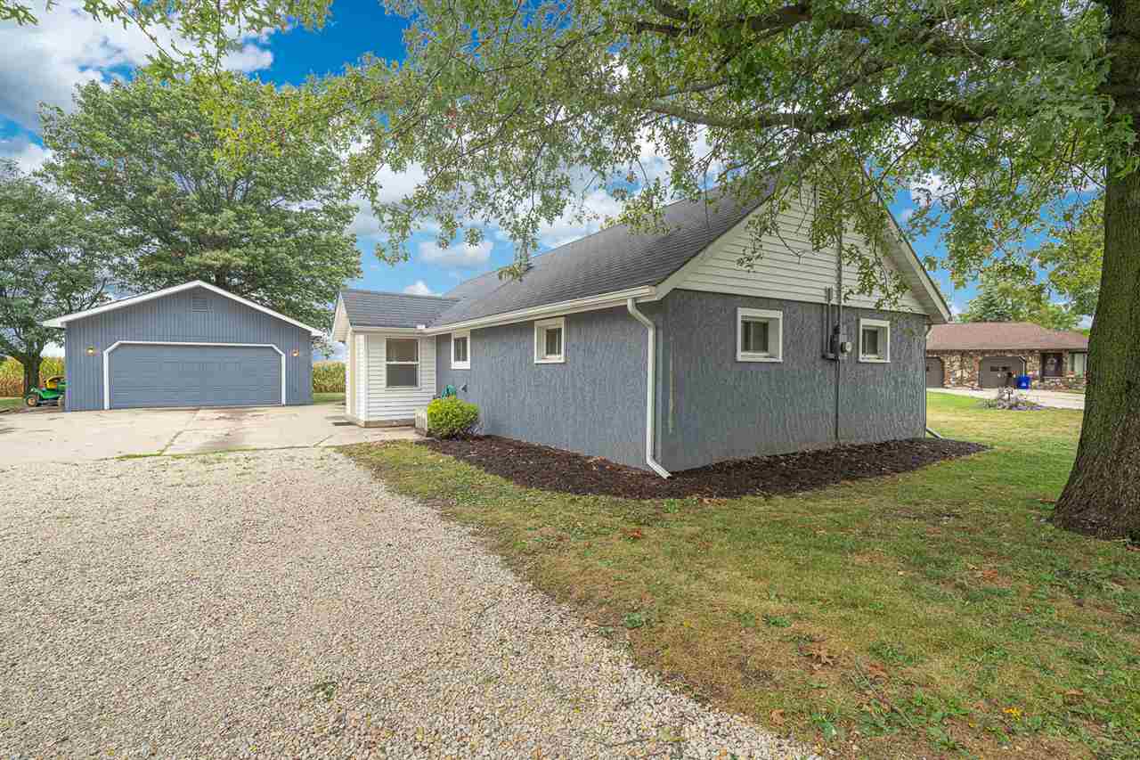 8424 South Main Street Rochelle, IL 61068 - Photo 4 of 26 a view of a house with a yard