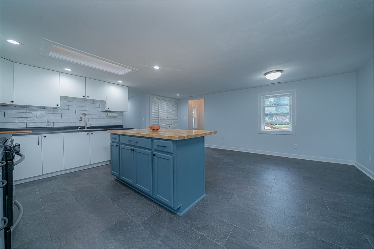 8424 South Main Street Rochelle, IL 61068 - Photo 8 of 26 a kitchen with a sink and cabinets