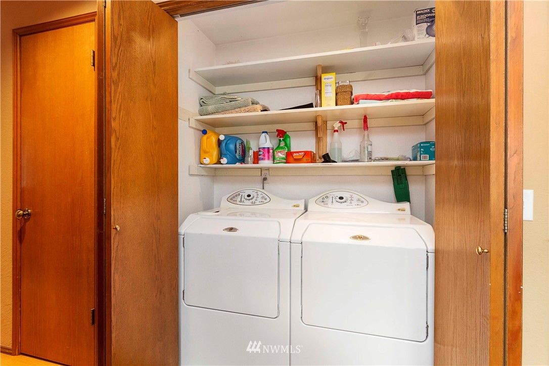 1508 243rd Place Southeast Bothell, WA 98021 - Photo 23 of 32 a utility room with dryer and washer