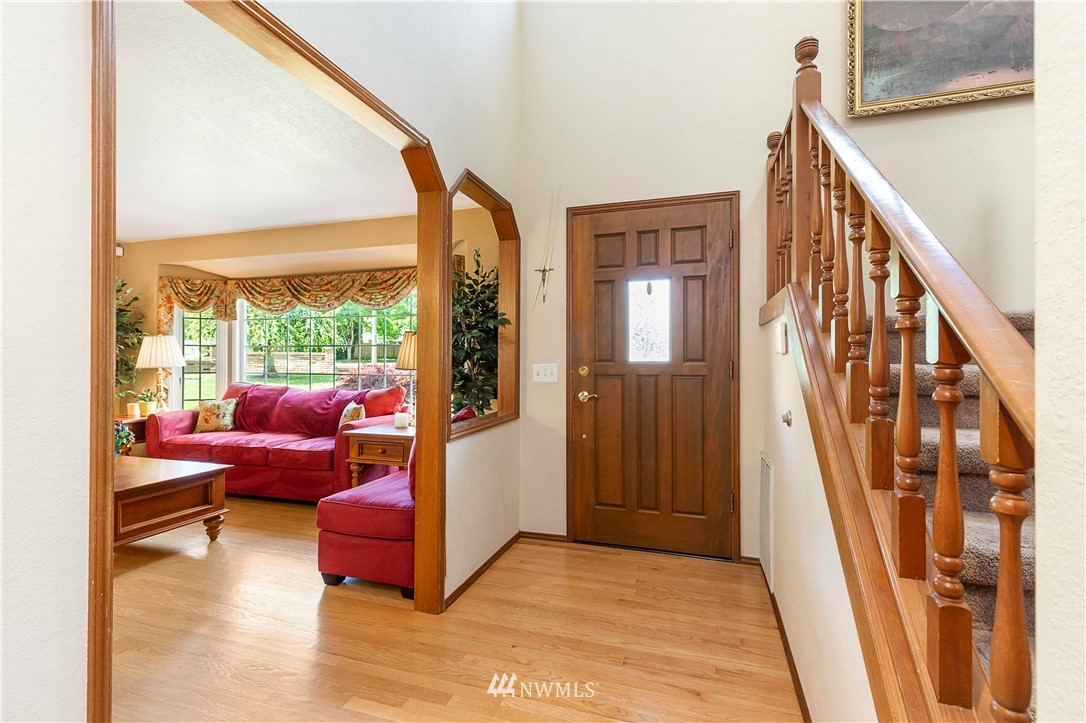 1508 243rd Place Southeast Bothell, WA 98021 - Photo 5 of 32 a living room with furniture and a window