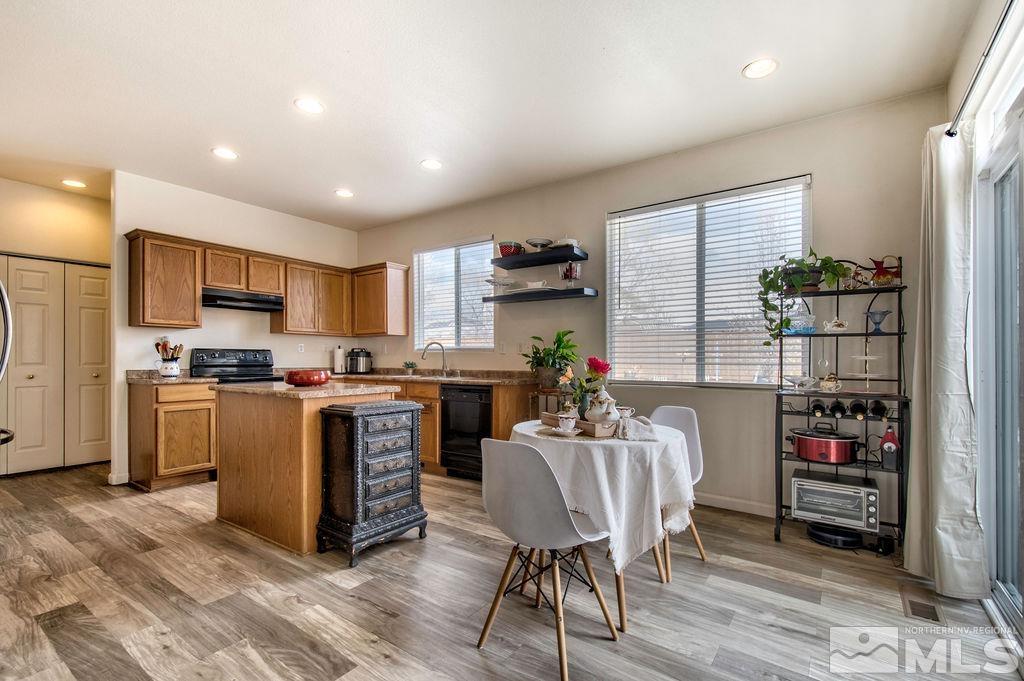 2275 Big Trail Circle Reno, NV 89521 - Photo 25 of 40 a kitchen with a refrigerator and a stove top oven