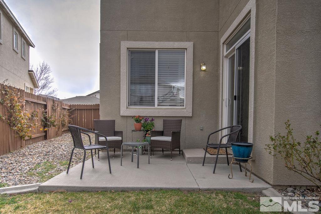 2275 Big Trail Circle Reno, NV 89521 - Photo 31 of 40 a view of a house with patio and a yard