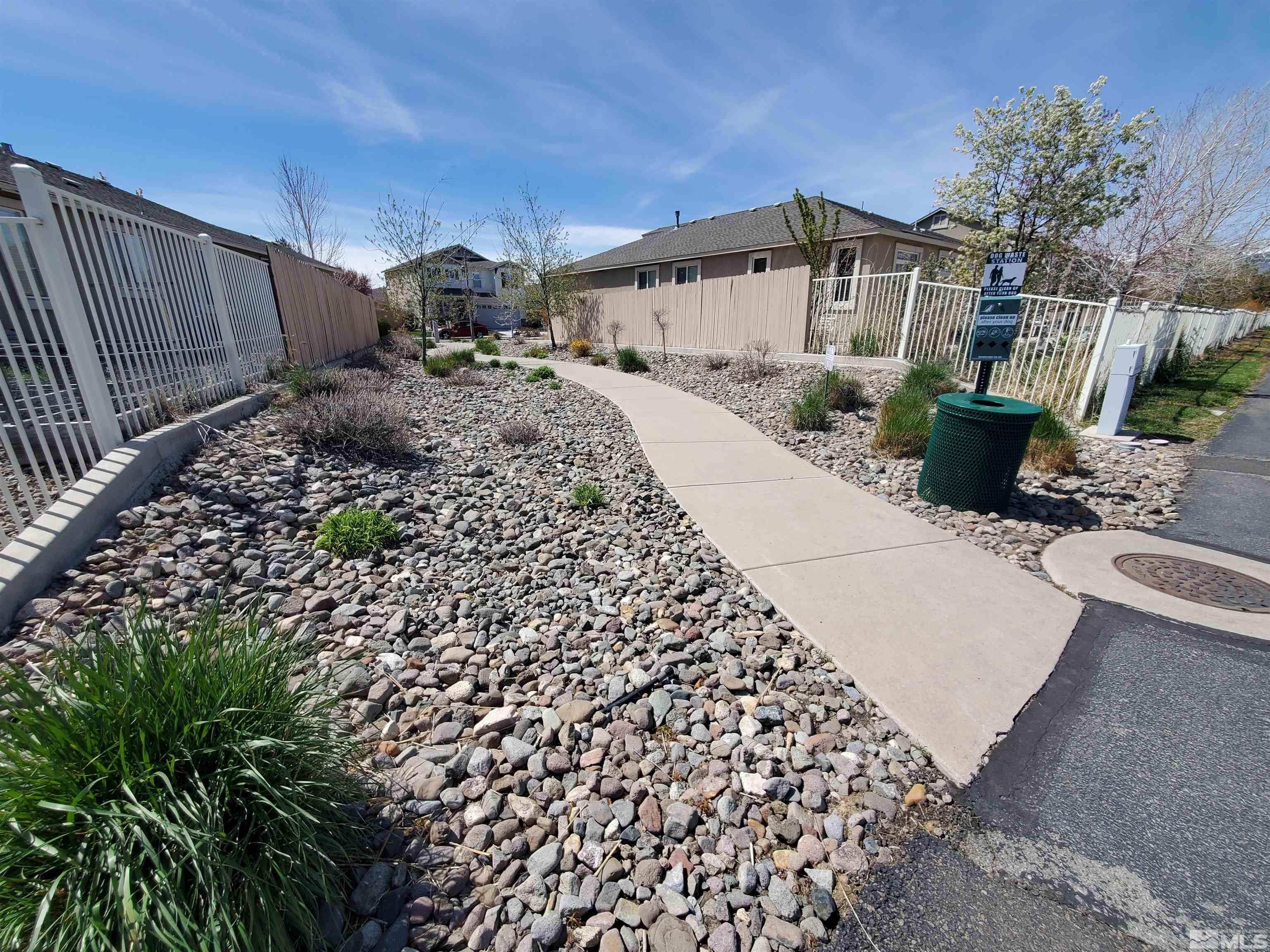 2275 Big Trail Circle Reno, NV 89521 - Photo 38 of 40 a view of a back yard of the house and a car parked in it