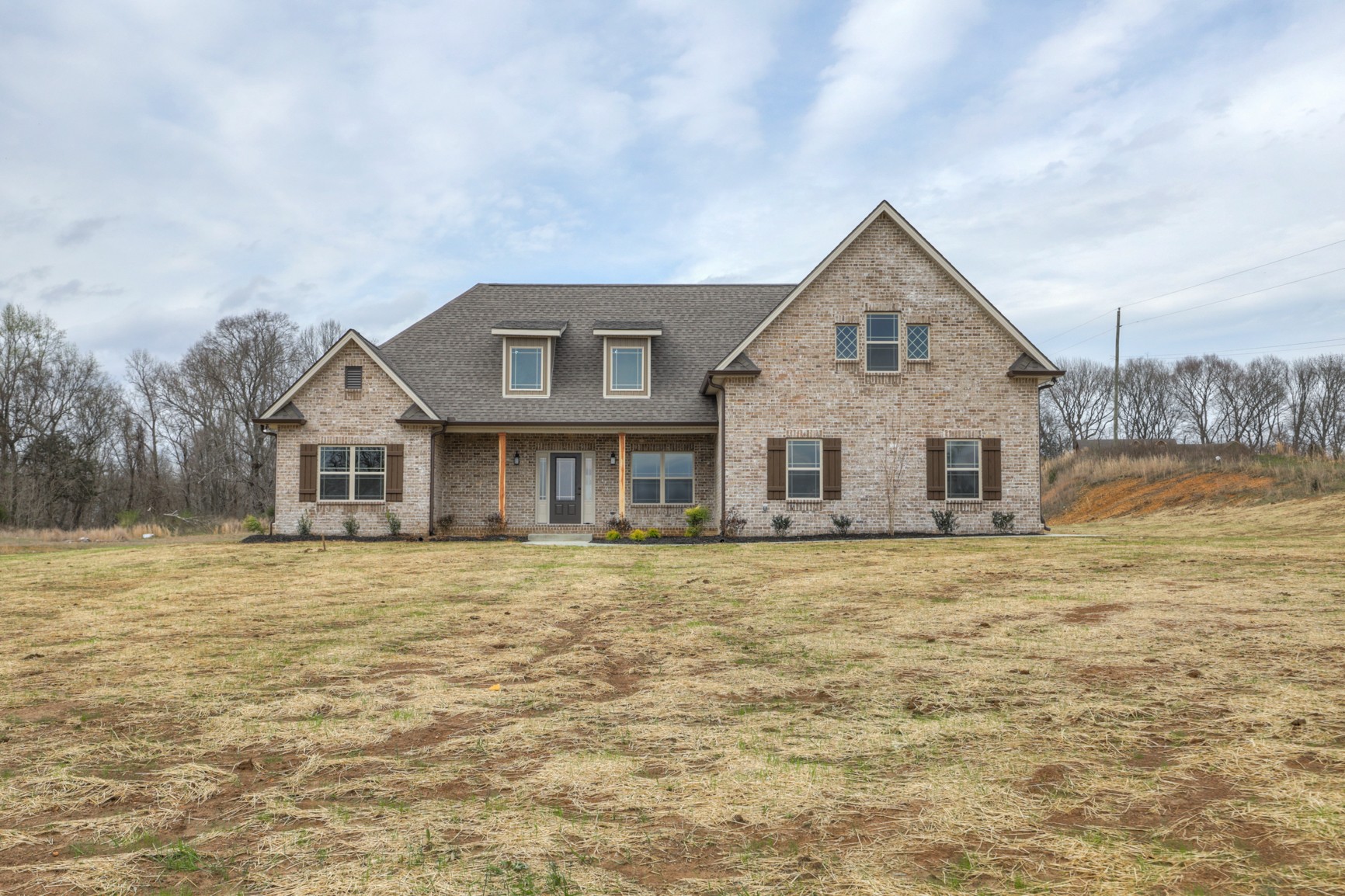2351 Belotes Ferry Road Lebanon, TN 37087 - Photo 1 of 34 a front view of a house with a yard