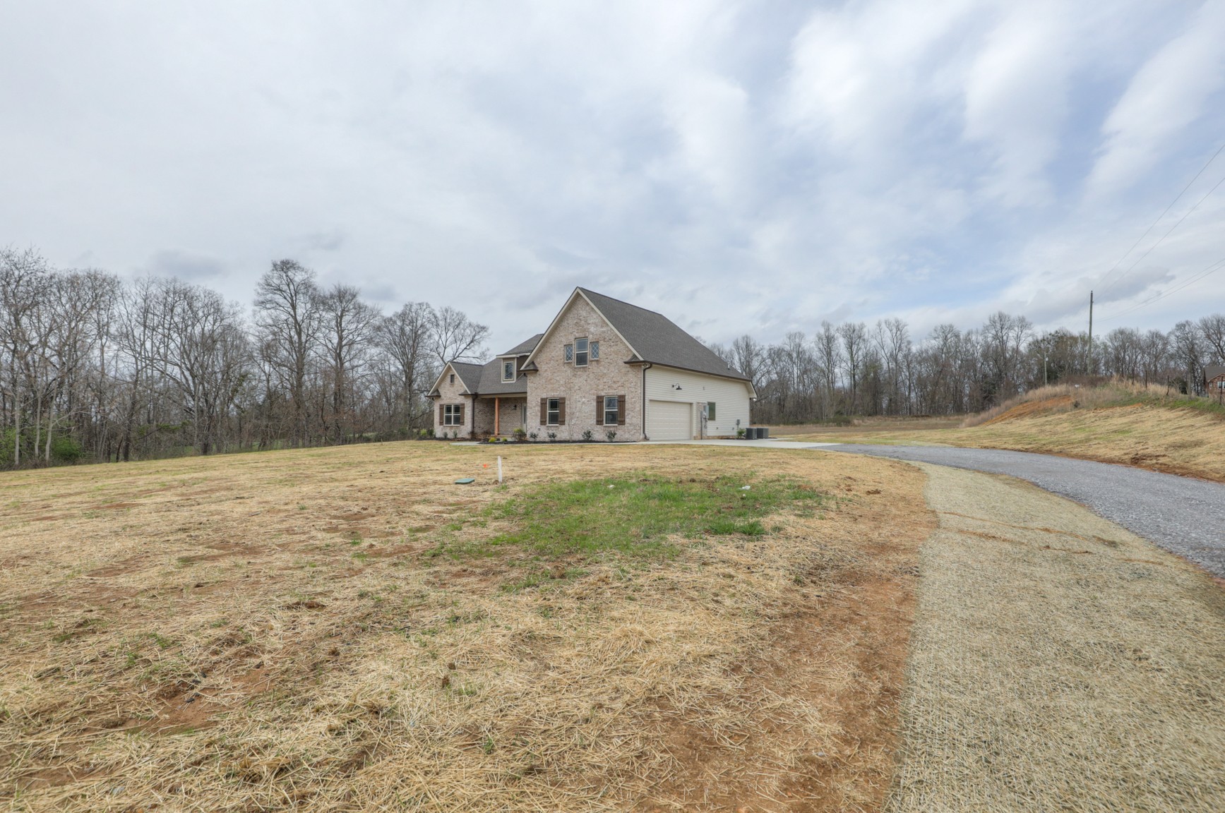 2351 Belotes Ferry Road Lebanon, TN 37087 - Photo 3 of 34 a house with green field in front of it