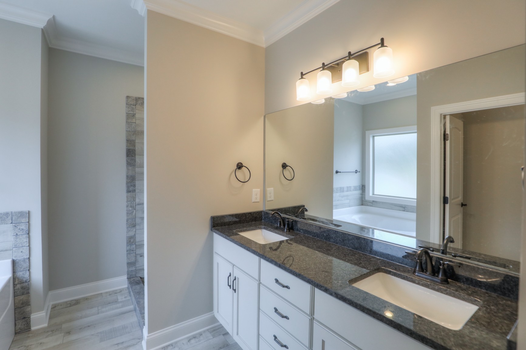 2351 Belotes Ferry Road Lebanon, TN 37087 - Photo 23 of 34 a bathroom with a double vanity sink and a mirror