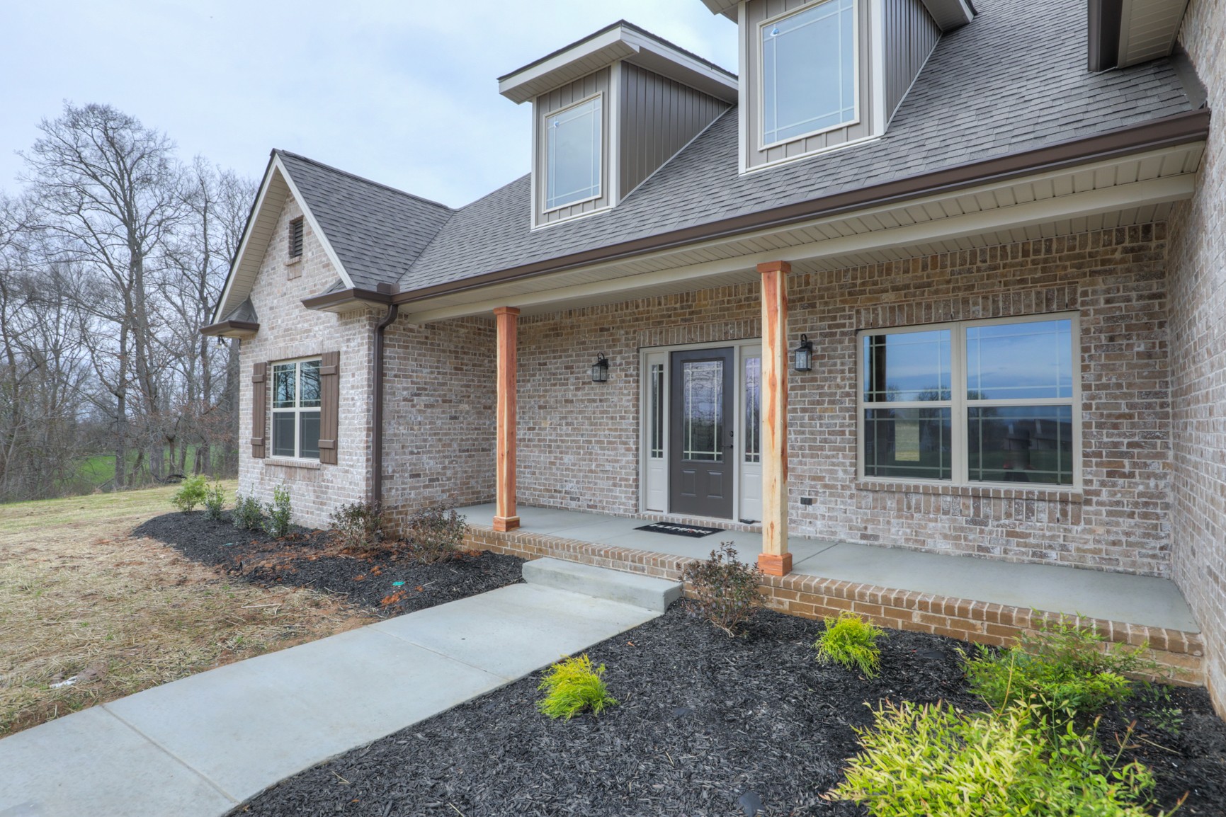 2351 Belotes Ferry Road Lebanon, TN 37087 - Photo 4 of 34 a front view of a house with garden