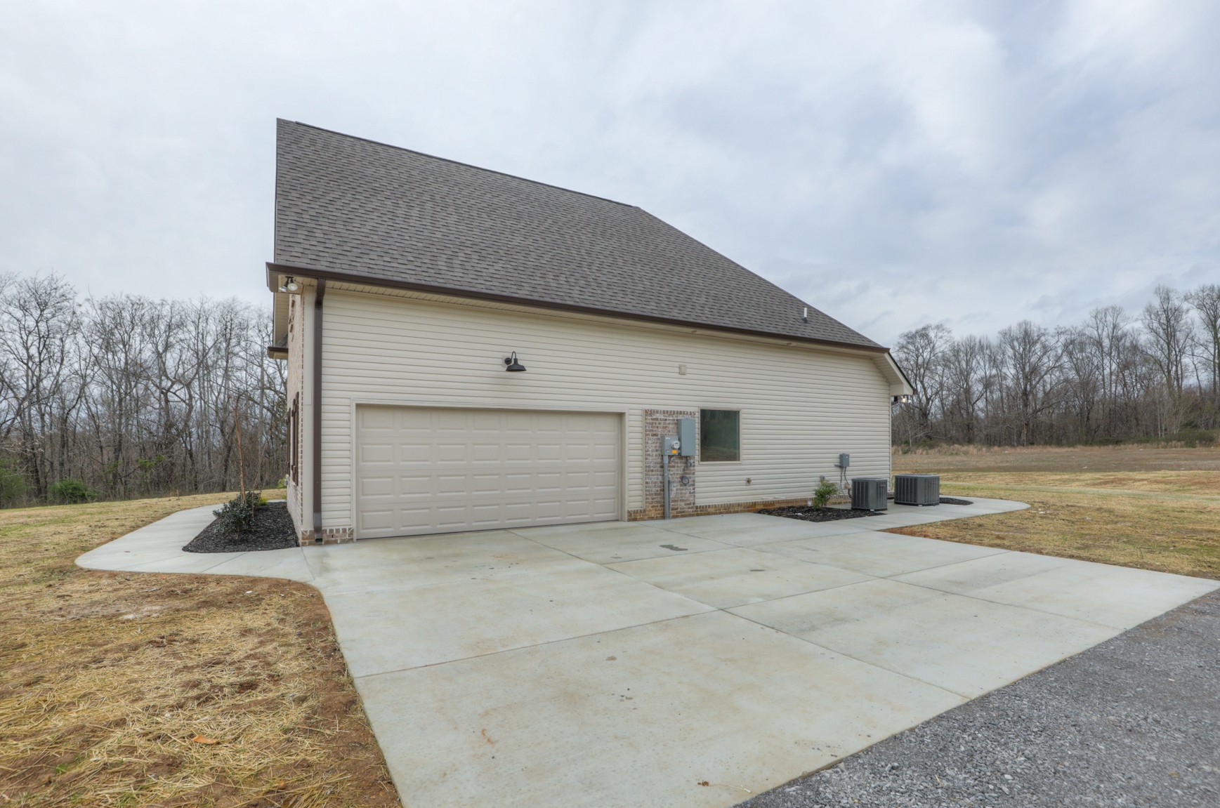 2351 Belotes Ferry Road Lebanon, TN 37087 - Photo 6 of 34 a view of a house with a yard and garage