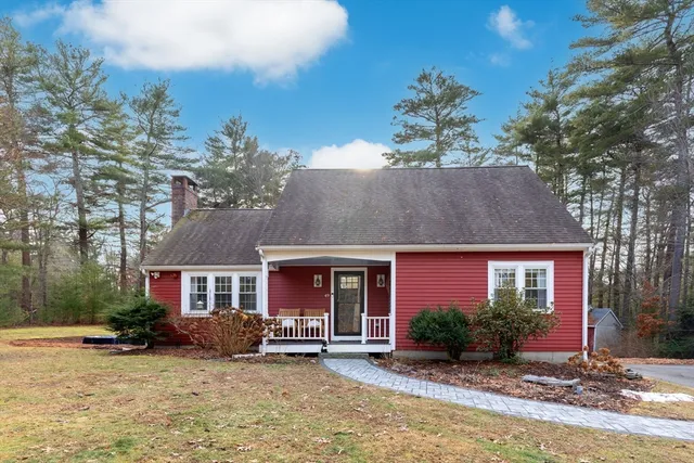a front view of a house with a porch