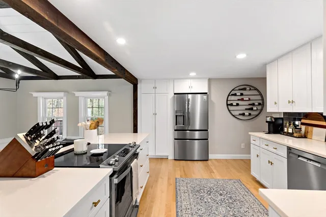 a view of a dining room with furniture and window
