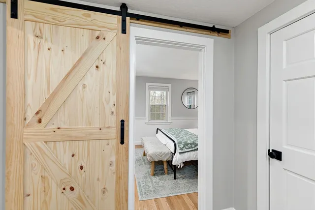 a white bath tub sitting next to a window