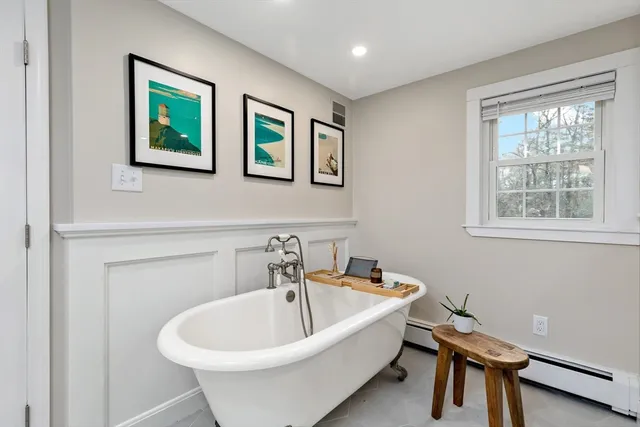 a view of a swimming pool with a lounge chair