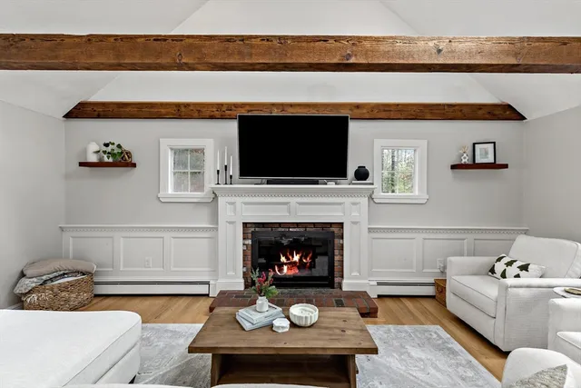 a kitchen with granite countertop a sink a stove and refrigerator