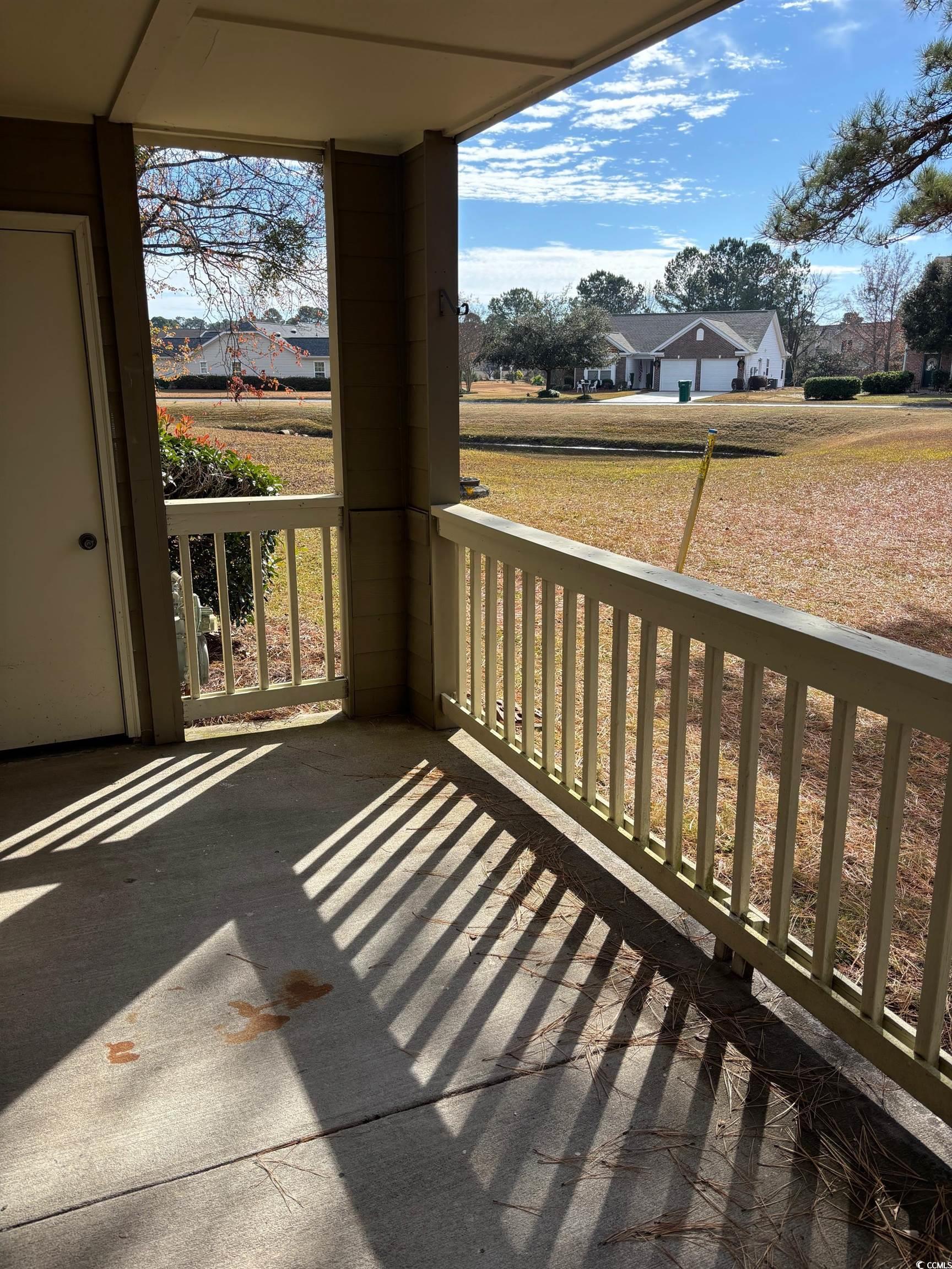 320 A Myrtle Greens Drive, Unit 320A Conway, SC 29526 - Photo 11 of 15 Balcony with a residential view