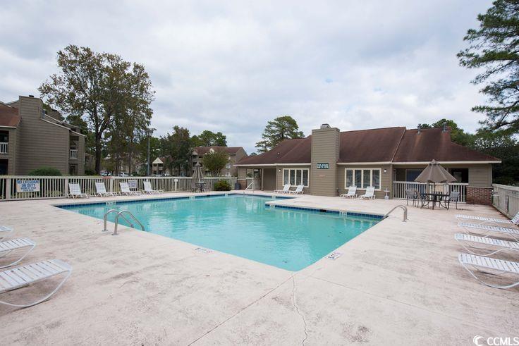 320 A Myrtle Greens Drive, Unit 320A Conway, SC 29526 - Photo 15 of 15 Community pool featuring a patio area