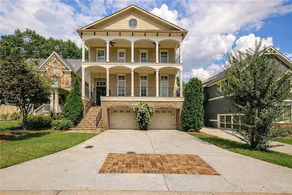 front view of a house with a yard