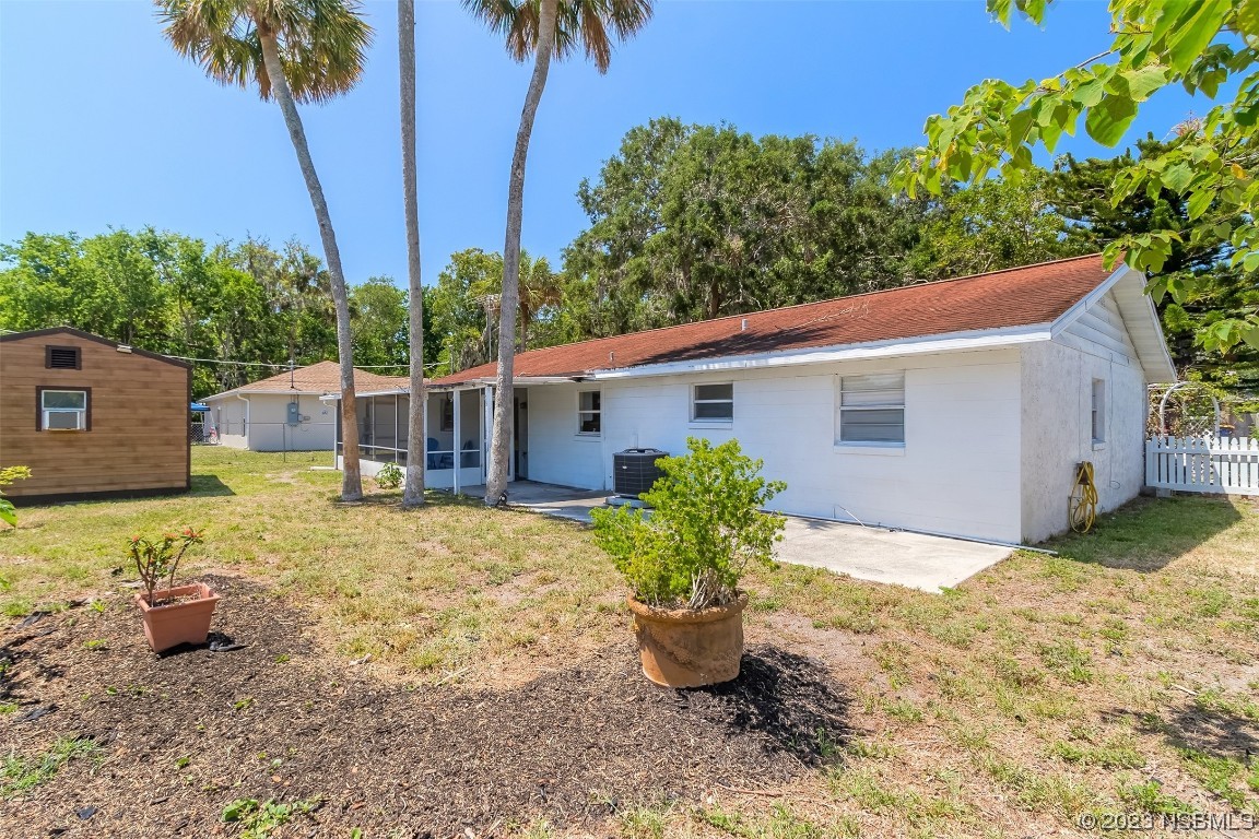 1851 Lime Tree Drive Edgewater, FL 32141 - Photo 21 of 25 a view of a house with backyard and sitting area