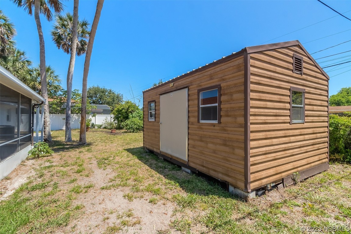 1851 Lime Tree Drive Edgewater, FL 32141 - Photo 23 of 25 a view of a house with a yard