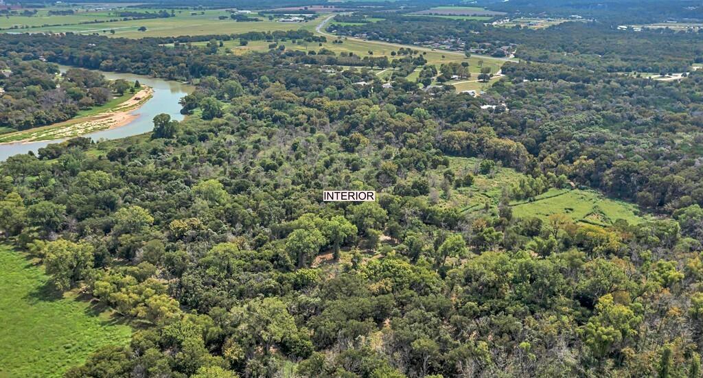 203 River Lane Waco, TX 76708 - Photo 15 of 40 an aerial view of a house with a yard