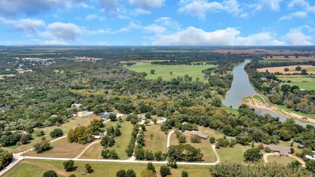 203 River Lane Waco, TX 76708 - Photo 2 of 40 an aerial view of residential houses with outdoor space