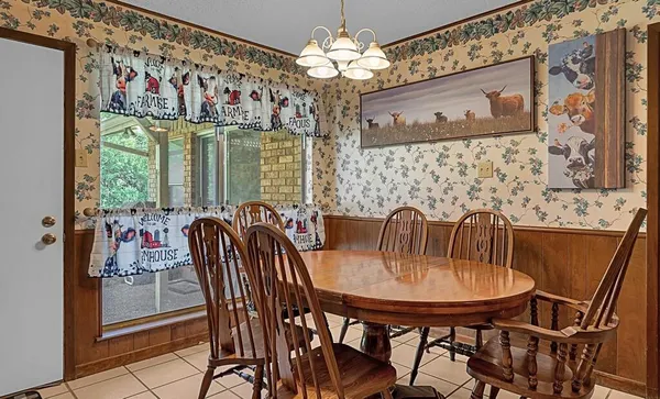 a kitchen with stainless steel appliances a sink stove and refrigerator