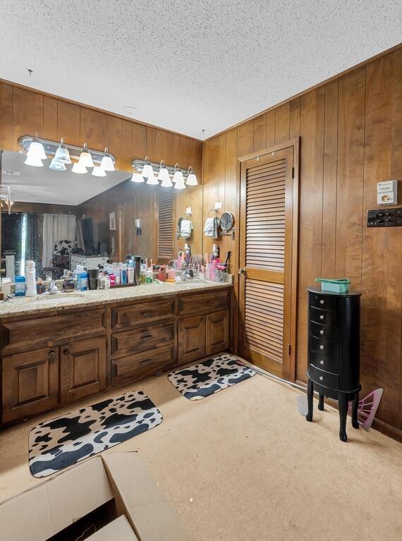 203 River Lane Waco, TX 76708 - Photo 30 of 40 a kitchen with stainless steel appliances a sink stove and refrigerator